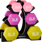 Set of colorful dumbbells with weights on a black stand, featuring Amazon Basics branding.